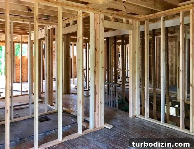 Duplex Renovation Complete: Fast Restoration of a Historic Home 14 Current framing progress
