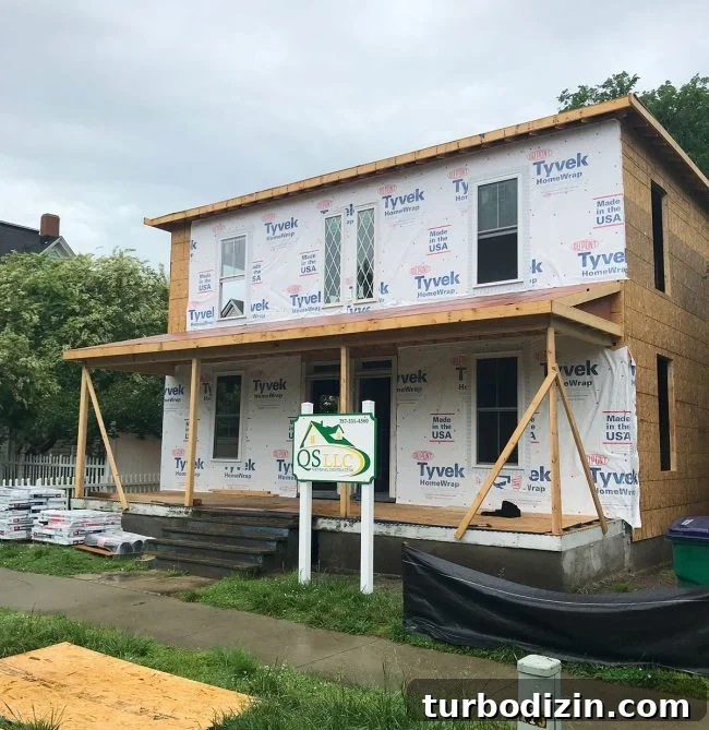 Duplex Renovation Complete: Fast Restoration of a Historic Home 21 Roof and exterior progress