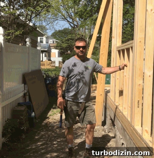 Duplex Renovation Complete: Fast Restoration of a Historic Home 5 Contractor showing framing stability