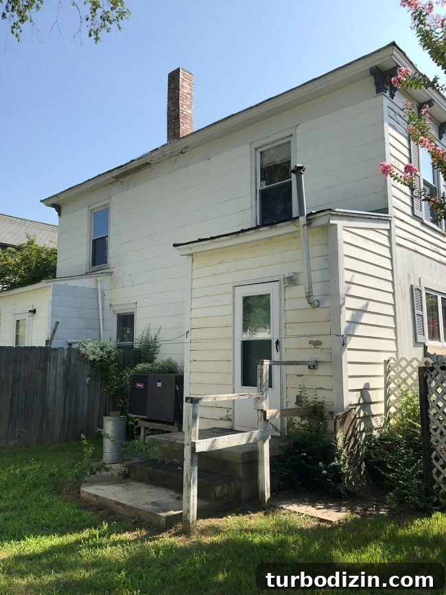 Duplex Renovation Complete: Fast Restoration of a Historic Home 7 Before: back of duplex