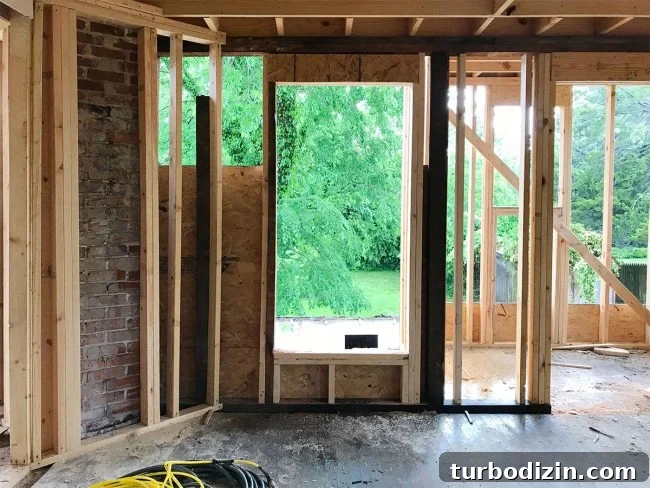 Duplex Renovation Complete: Fast Restoration of a Historic Home 9 New bedroom window opening