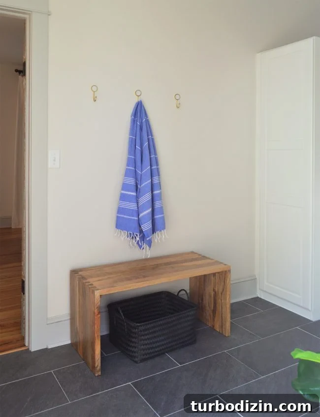 DIY Long Hook Rail for Mudroom: Step-by-Step Build & Install 4 before photo with three gold hooks on wall in mudroom