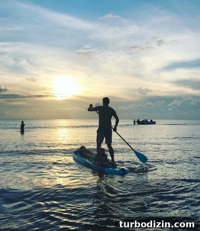 Cape Charles, Virginia: Your Complete Guide to the Beach Town 10 paddleboarding with children at sunset at cape charles beach