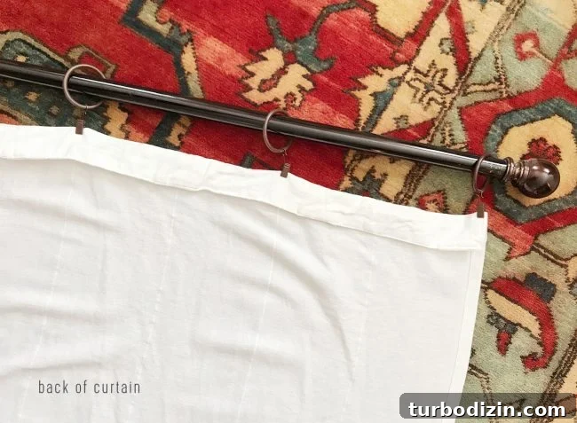 back side of curtain with curtain rod ring clips