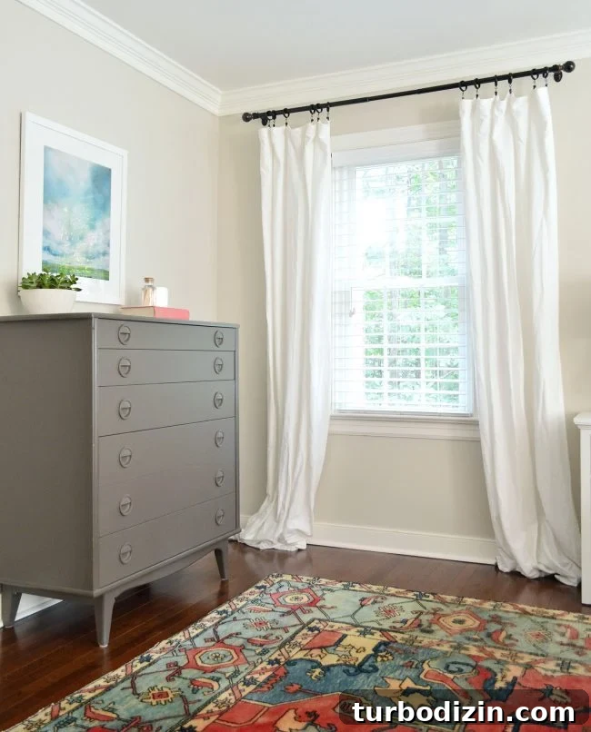 messy curtains hung but not ironed