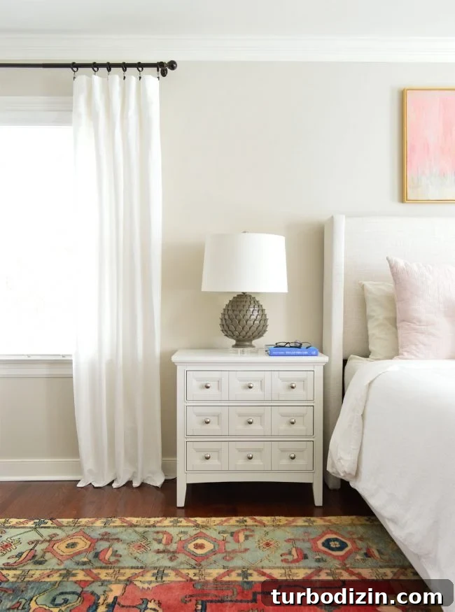 white ikea lenda curtain panels next to nightstand