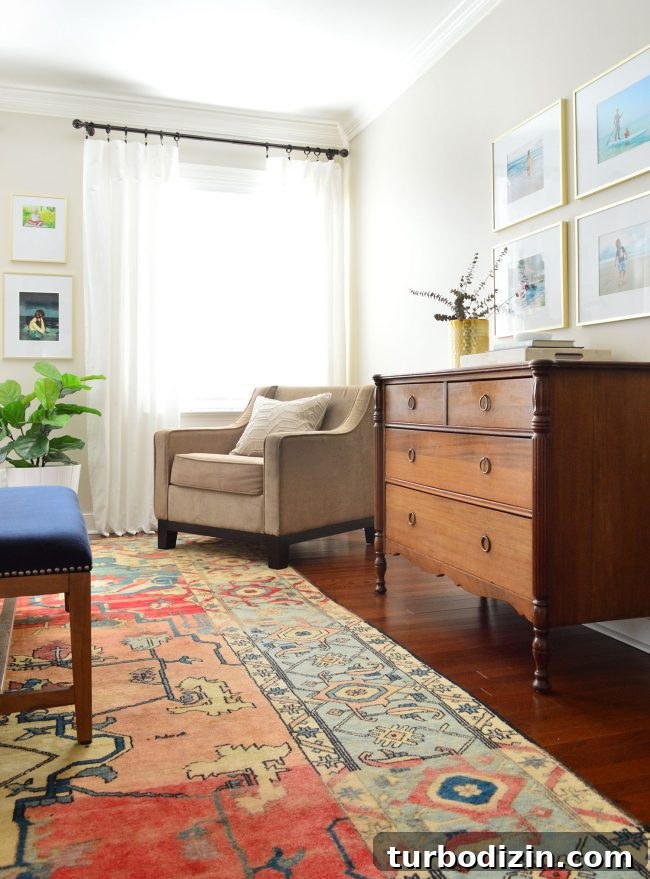vintage dresser in master bedroom with white curtains