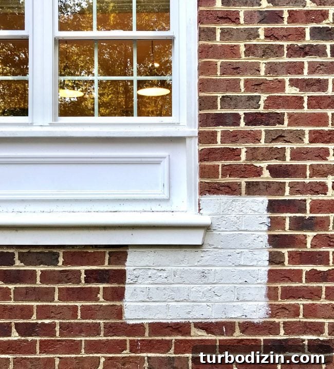 moderne white paint sample on red brick house