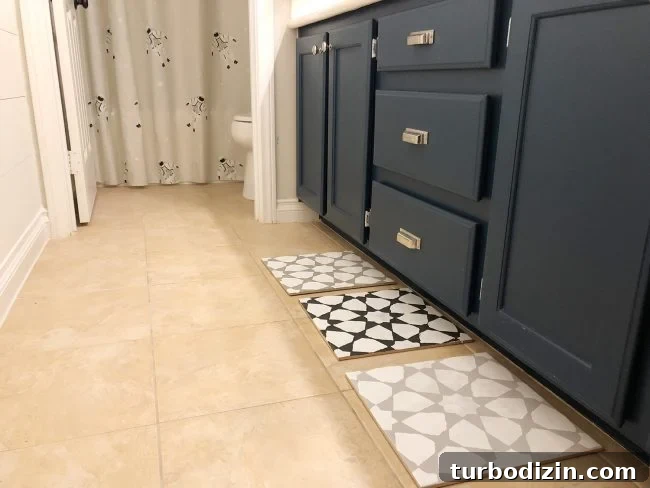 Sample tiles laid out on bathroom floor
