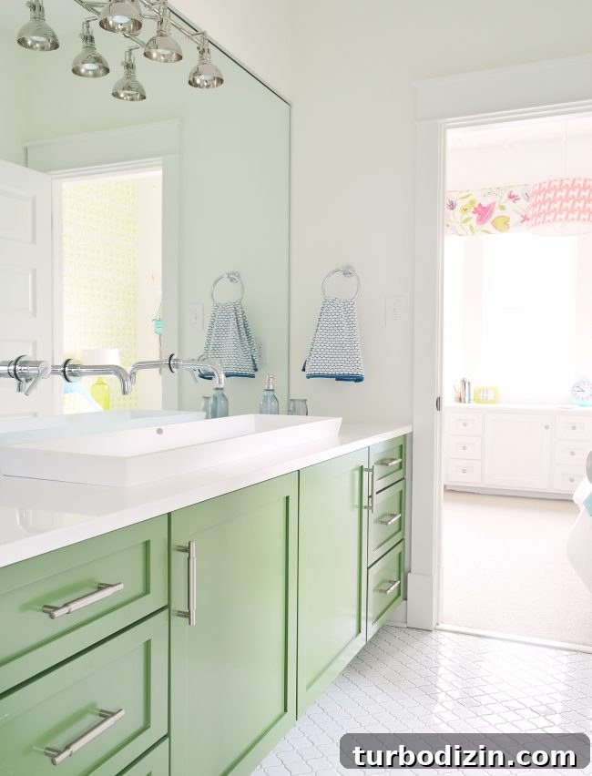 House Must-Haves: What We'd Put on Our Ultimate Home Checklist 13 Jack-and-jill bathroom with green vanity