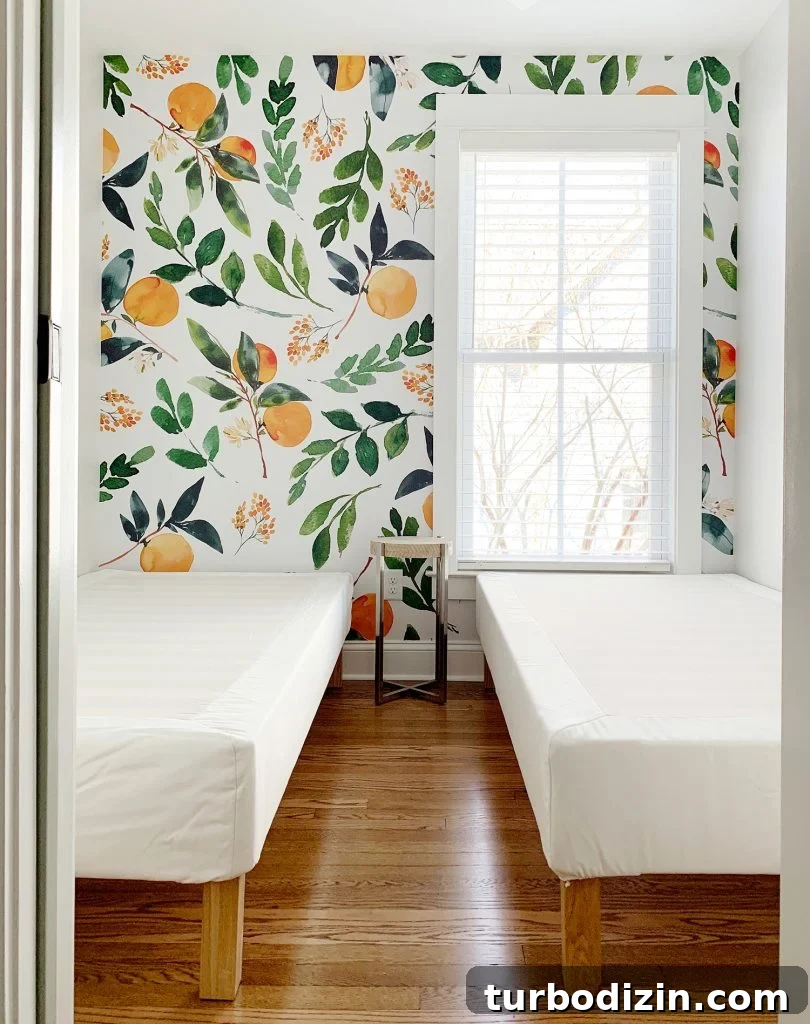 Peel-And-Stick Wall Mural With Oranges In Room With Two Twin Beds