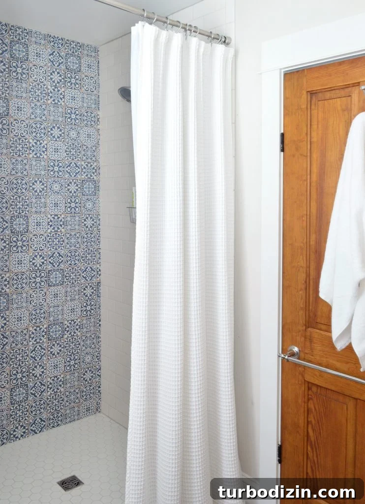 When Life Falls Apart: How to Find Stability When Everything Goes Wrong 4 Blue Accent Tile In Shower Of Hall Bathroom With Wood Door