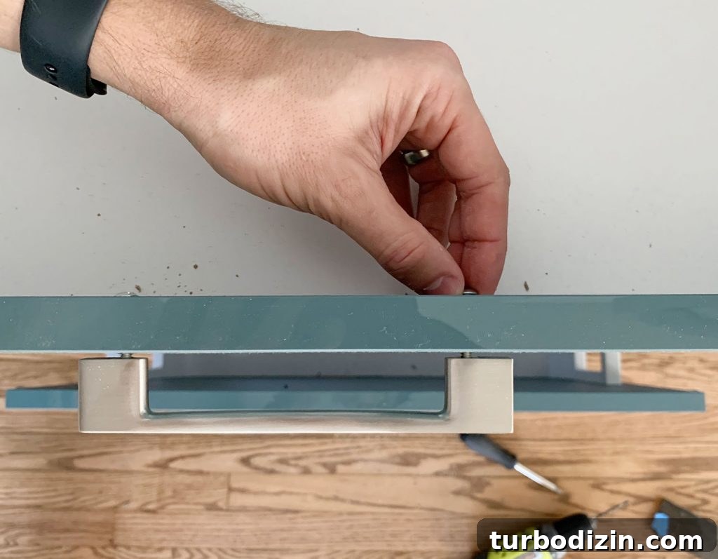 Tightening Kitchen Cabinet Hardware Screw By Hand