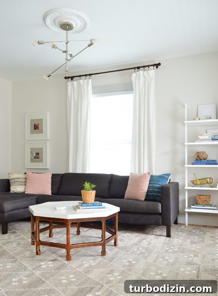 Bright, Airy Living Room Ideas That Stay Comfortable and Practical 4 neutral living room with dark charcoal ikea sectional