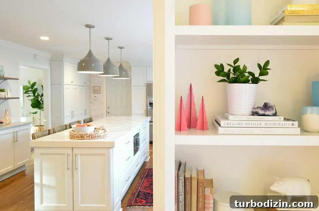 Low-Maintenance Houseplants and Lifelike Faux Alternatives 7 Plant on built-in bookcase in living room with kitchen in the background