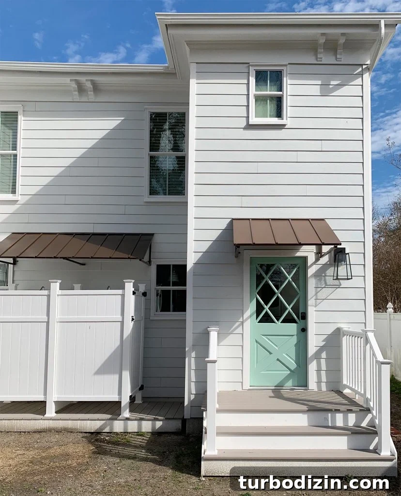 This image has an empty alt attribute; its file name is Duplex-Rear-Exterior-After-South-Side-Straight-828x1024.jpg