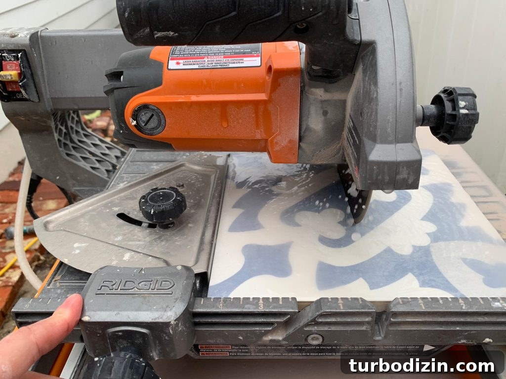 8 Essential Steps to Take Before You Start Tiling 13 Cutting Patterned Tile On Wet Saw Using Guide