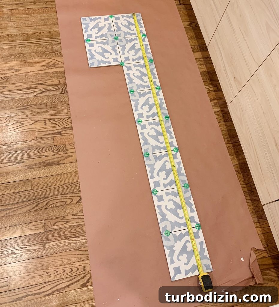 8 Essential Steps to Take Before You Start Tiling 9 Backsplash Tile Laid On Floor To Determine Length And Pattern