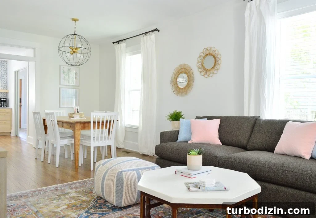 Duplex Living Room and Dining Room Makeovers: Before & After Tour 14 Open Living And Dining Space In Duplex With Crate And Barrel Sofa