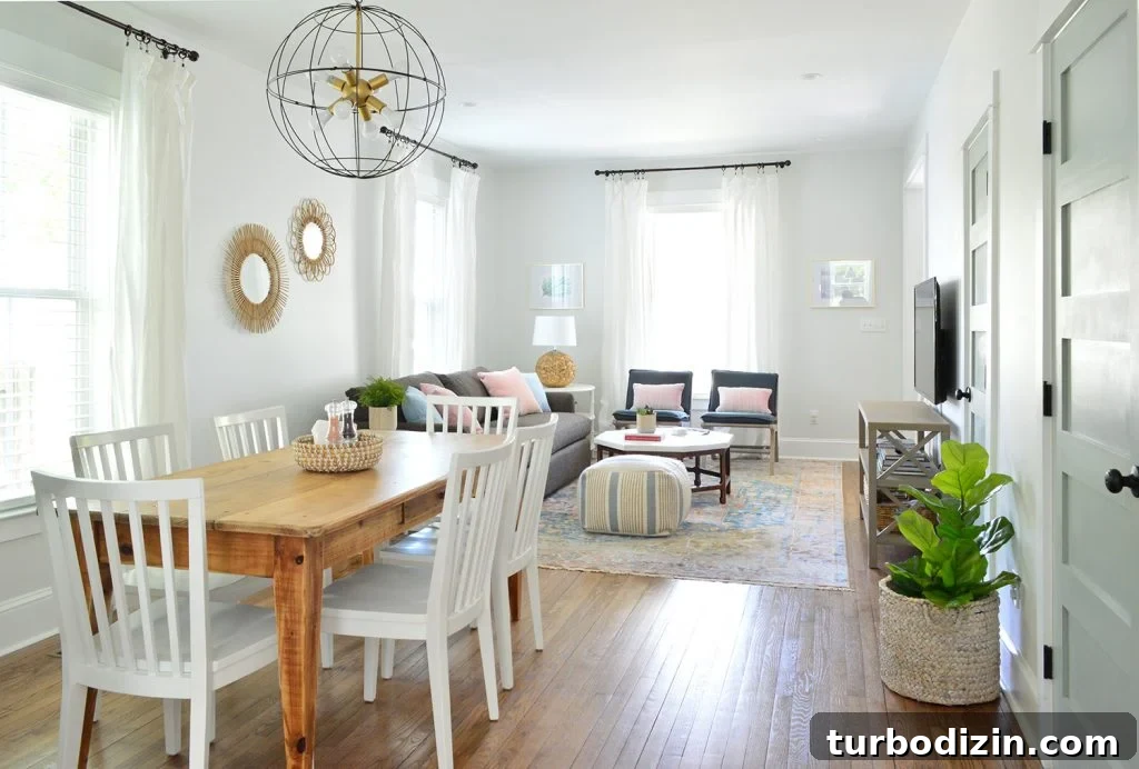 Seeing Another Blogger’s Home in Person: What Surprises Await? 7 Open living and dining room with wood table and cage chandelier