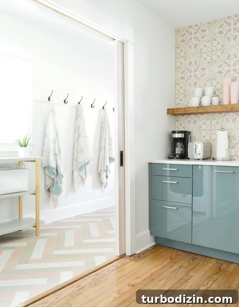 Airbnb Laundry & Mudroom Makeovers: Before and After Transformations 2 Hangin Towels Seen Through Kitchen Pocket Doors Into Mudroom