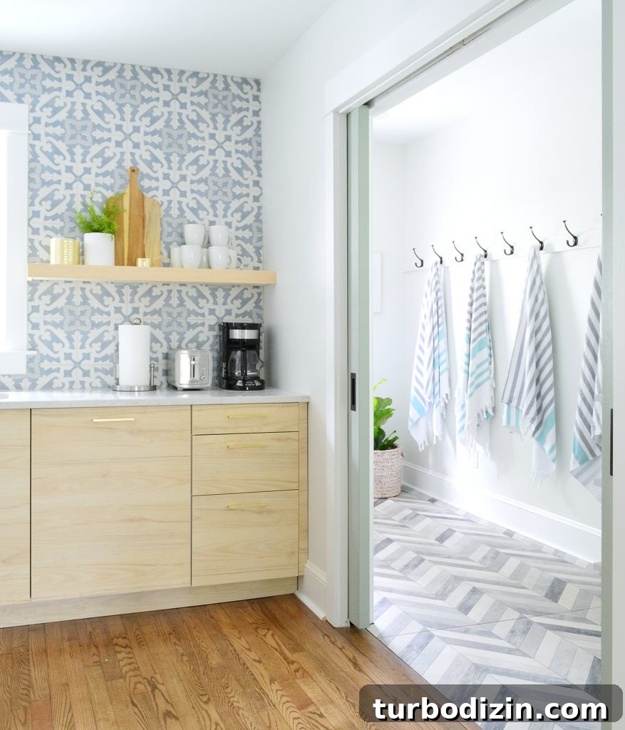 Airbnb Laundry & Mudroom Makeovers: Before and After Transformations 11 Duplex Mudroom Seen Through Kitchen Pocket Doors