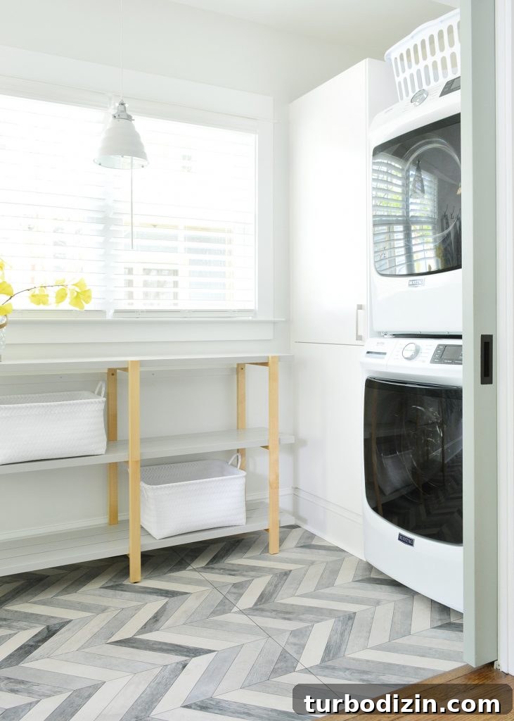 Airbnb Laundry & Mudroom Makeovers: Before and After Transformations 13 Duplex Laundry Room With Open Shelf And Stacked Laundry