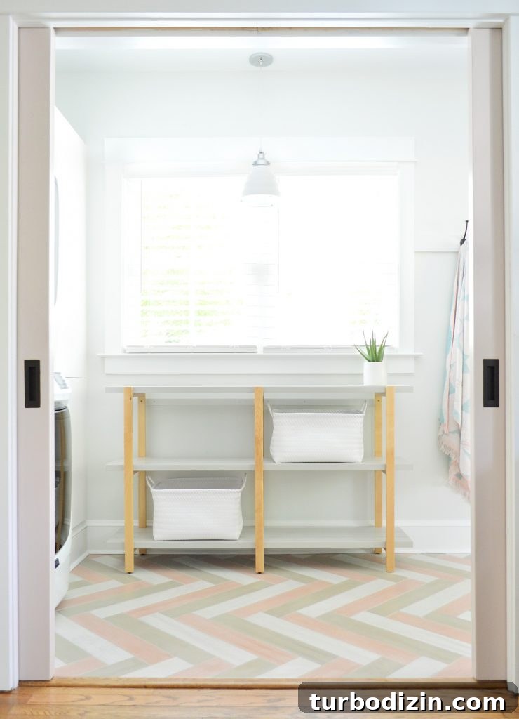 Airbnb Laundry & Mudroom Makeovers: Before and After Transformations 6 Duplex Mudroom Pantry Storage Open Ikea Shelf Pink Herringbone Floor