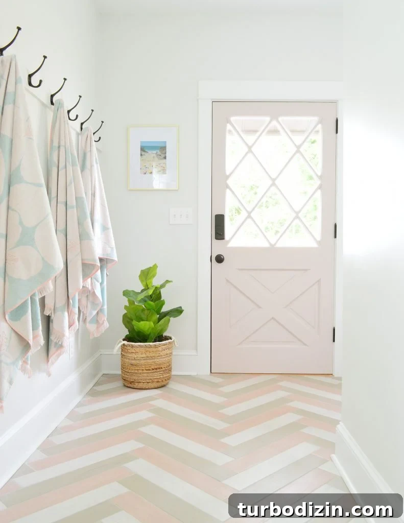 Airbnb Laundry & Mudroom Makeovers: Before and After Transformations 9 Pink Diamond Door In Mudroom With Herringbone Pink Tile Floor