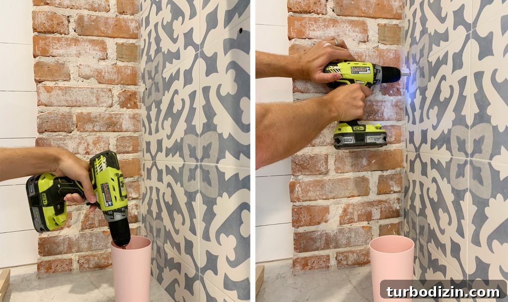 Dipping Drill Bit Into Cup of Water While Drilling Through Tile