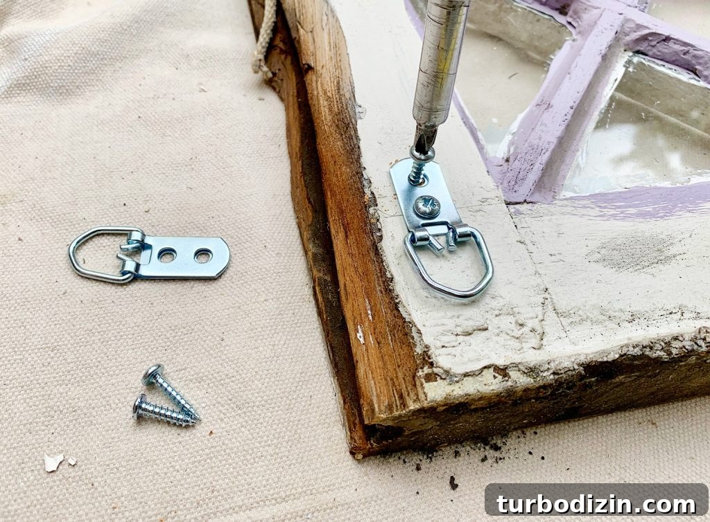 DIY Faux Stained Glass Window Tutorial: Step-by-Step Guide 7 Screwing D Rings To Hang Diamond Glass Window
