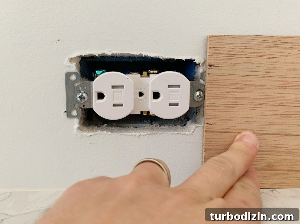 DIY Shiplap Wall Plank Makeover for $31 Total 15 Height Of Electrical Outlet Marked Using Scrap Wood Panel