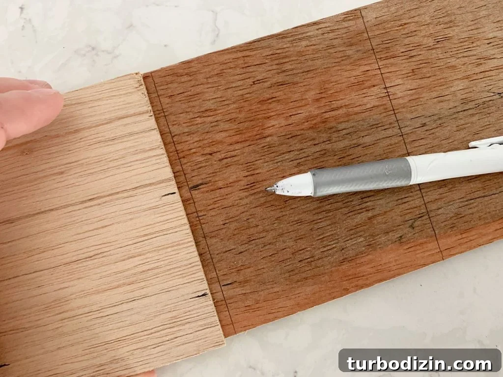 DIY Shiplap Wall Plank Makeover for $31 Total 16 Lines Marked For Cutting Hole For Electrical Outlet