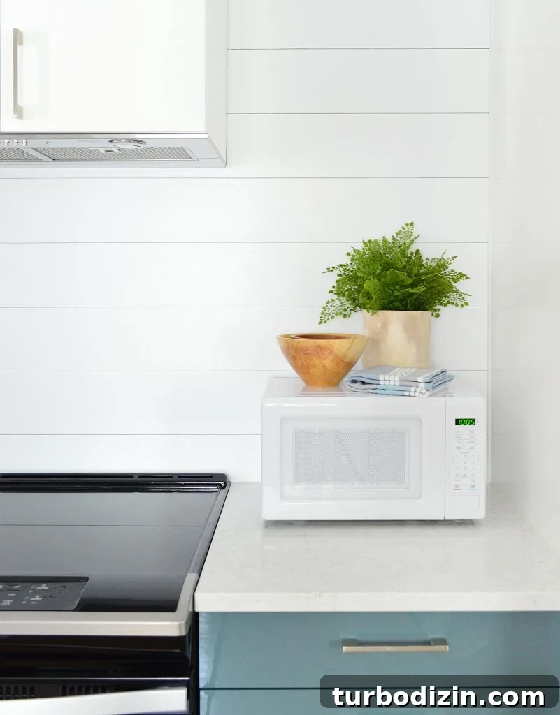 DIY Shiplap Wall Plank Makeover for $31 Total 25 Shiplap Planking Detail In Duplex Kitchen With Blue Cabinets