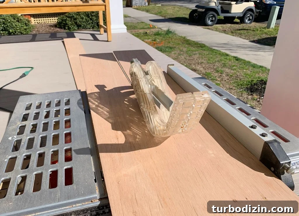 DIY Shiplap Wall Plank Makeover for $31 Total 7 Cutting Wood Strips In Half Along Table Saw For Shiplap Look