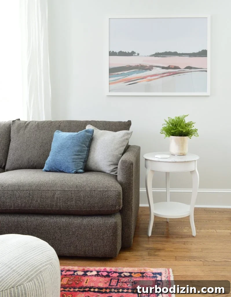 5 Things We Learned Hosting Airbnb This Summer 14 Juniper Print Shop Art In Bright Living Room With Marble Table Crate And Barrel Sofa