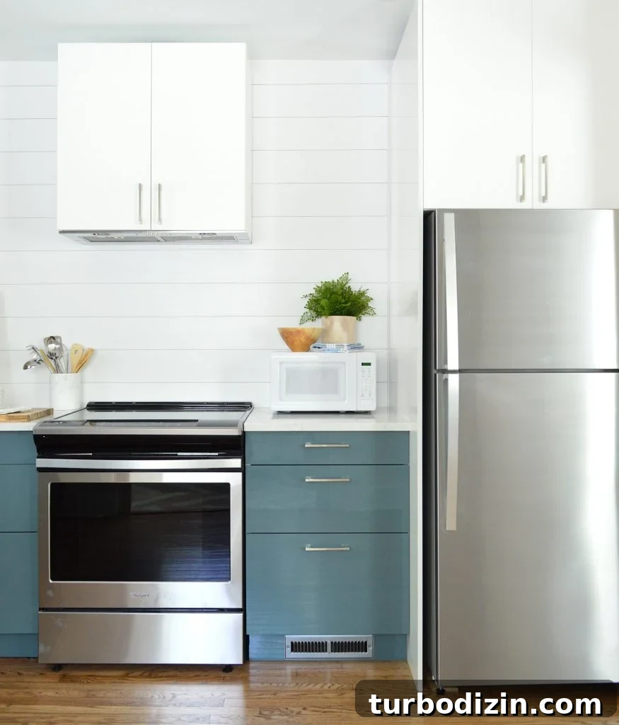 5 Things We Learned Hosting Airbnb This Summer 9 White Planked Wall Shiplap With Blue Ikea Cabinets