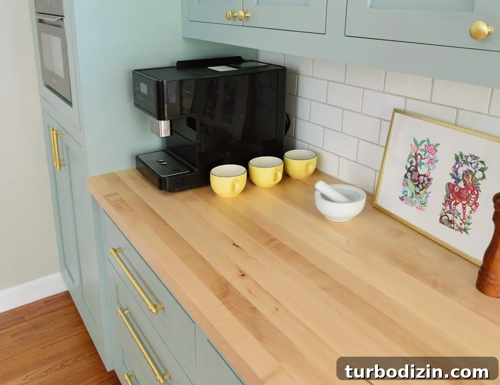 Update Old Kitchen Cabinets with New Inset Doors for a Fresh Look 9 Butcher Block Countertop With Subway Tile Backsplash in Halcyon Green Blue Kitchen
