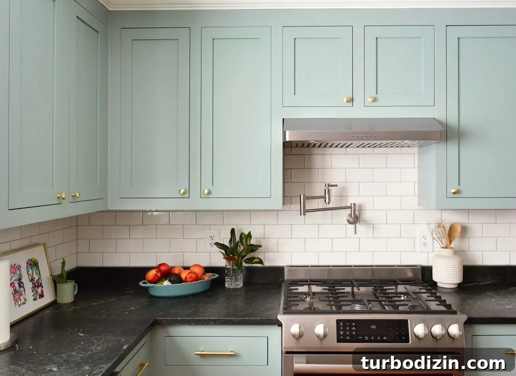 Update Old Kitchen Cabinets with New Inset Doors for a Fresh Look 3 Halcyon Green Blue Kitchen Wall Cabinets With Gold Brass Knobs Above Stove