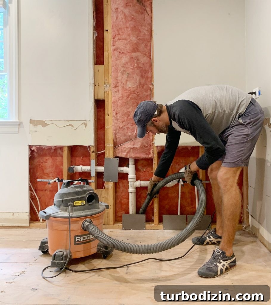Haunted Room at Our Beach House: True Coastal Ghost Story 4 Wet dry vac in use during demo cleanup