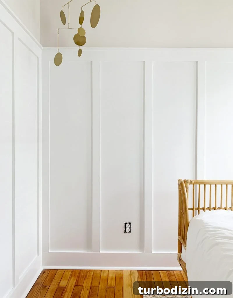 Tall DIY Board And Batten Wall Wainscoting Installed In Beach House Bedroom