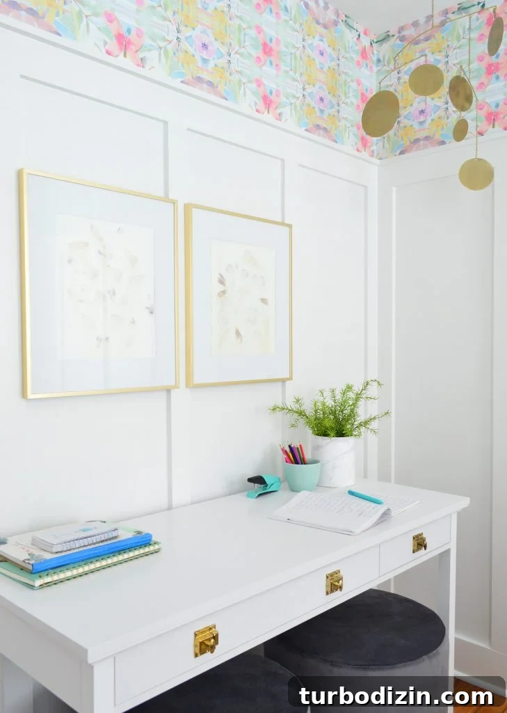 Coastal Bedroom Design: Wallpaper with Board and Batten Trim 10 White Desk With Gold Hardware Against Board And Batten With Brass Frames And Mobile
