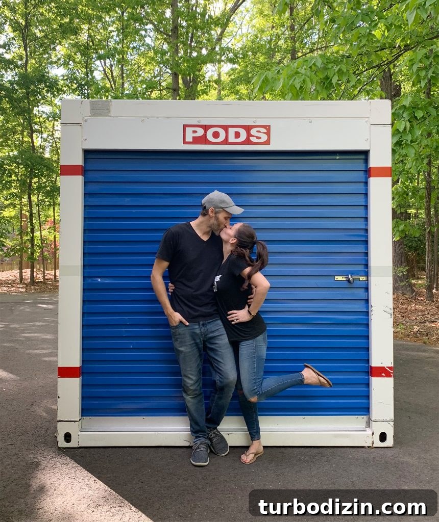 Managing Renovation Stress: 5 Practical Tips for a Smoother Remodel 15 John and Sherry kissing in front of moving PODS storage container