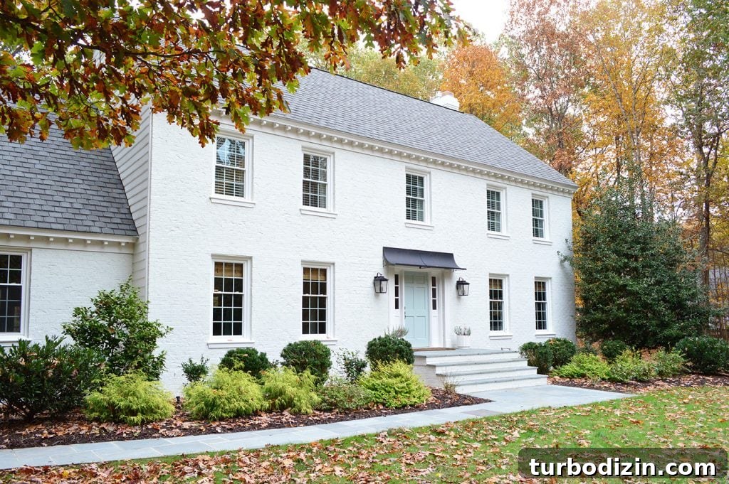Exterior Upgrades After Painting Our Brick House White 6 White Painted Brick House With Fall Leaves