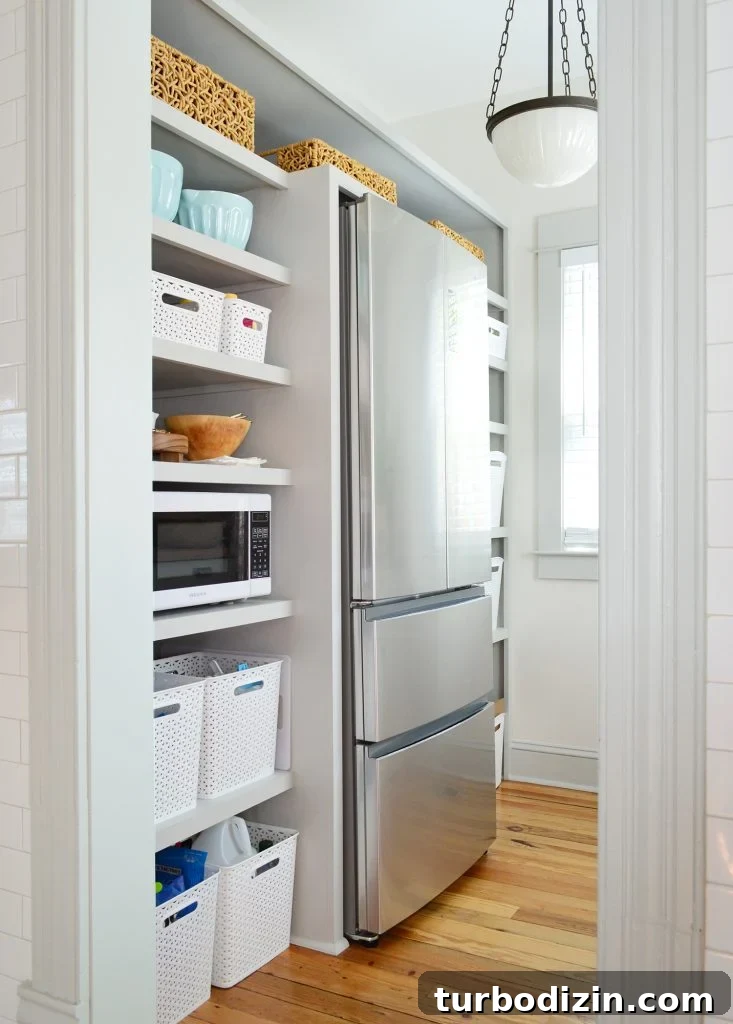 Walk In Beach House Pantry With More Baskets On Shelves
