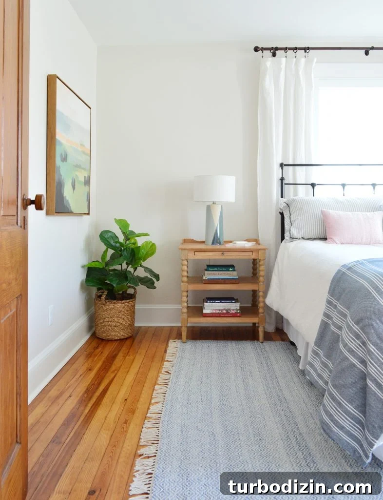 Top Picks We Own and Love — On Sale Right Now 8 Beach House Front Bedroom With Blue Rug And Wooden Nightstand
