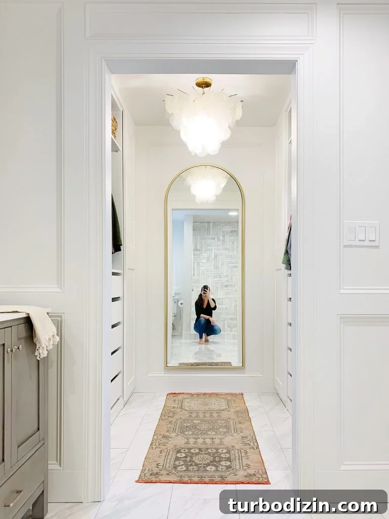 Major Bathroom and Closet Remodel Reveal: Stylish Storage Ideas 2 Sherry Selfie In Arched Brass Mirror In Master Closet