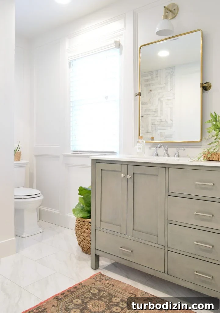 Major Bathroom and Closet Remodel Reveal: Stylish Storage Ideas 3 Master Bathroom Update With Gray Vanity Installed With Brass Mirror