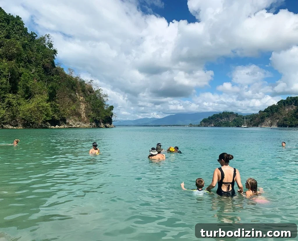 Kids Swimming At Playa Biesanz Beach In Manual Antonio Costa Rica 