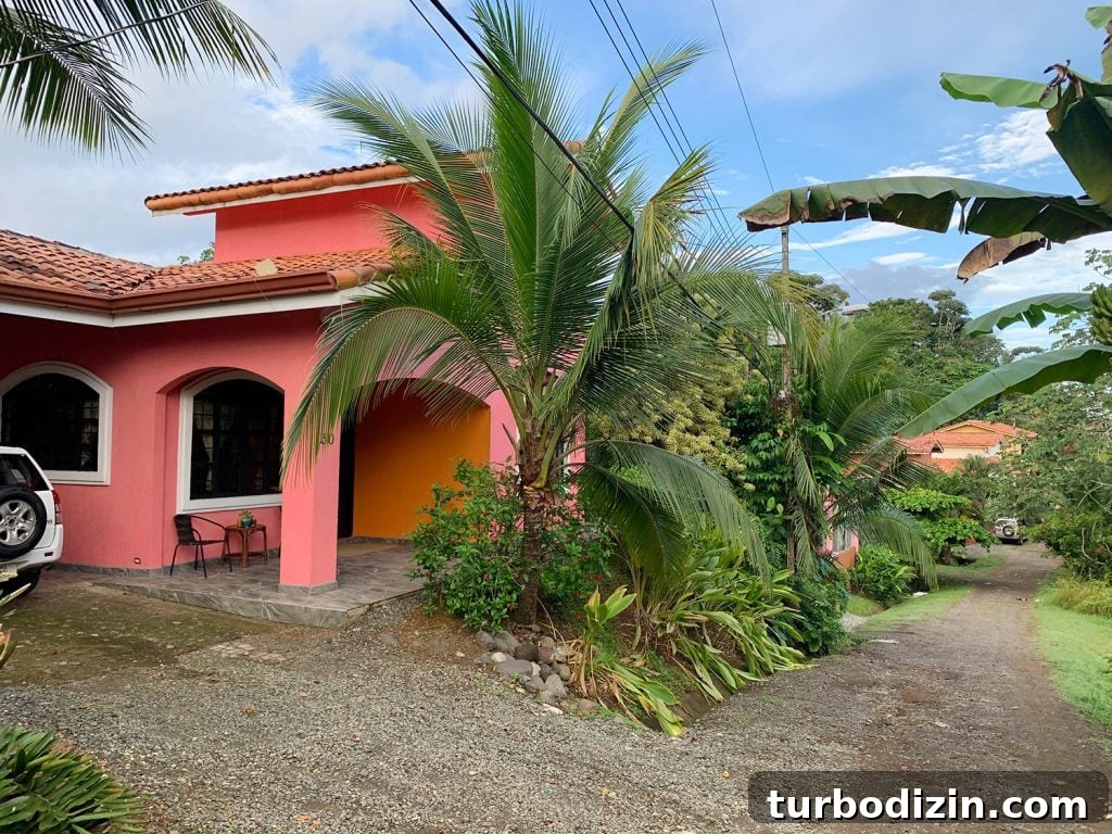 Colorful Airbnb On Dirt Road In Costa Rica